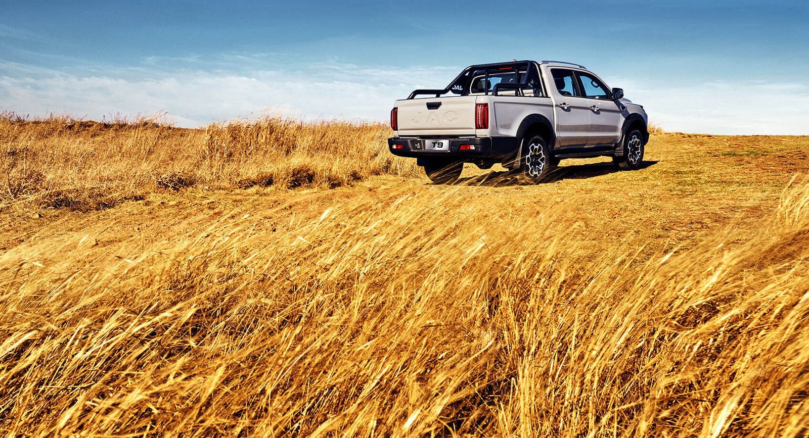 JAC Pickup Hantu PHEV / Hunter PHEV 2025 — экстерьер, rear 3q grass, рынок China / export official