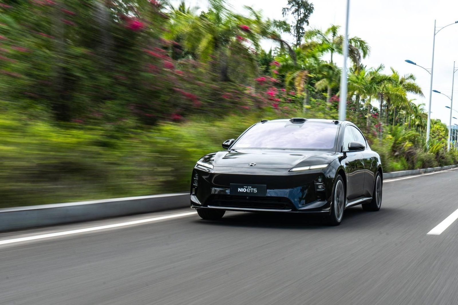 NIO ET5 Touring 2026 — экстерьер, вид спереди 3/4, рынок internal_mvp